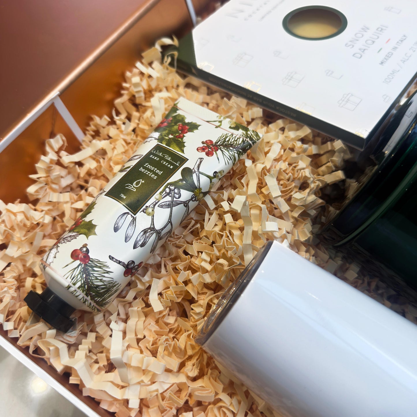 Bottle of wine with decorative label in a gift box