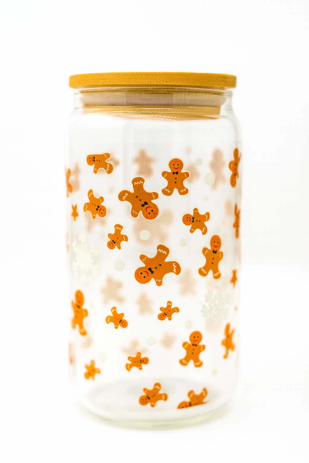 Jar with gingerbread man pattern on a white background