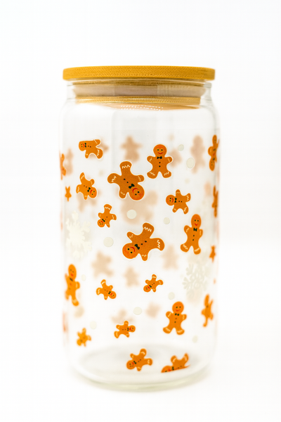 Jar with gingerbread man pattern on a white background