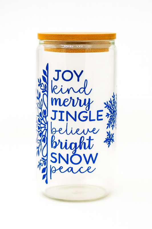 Tumbler with blue text and snowflake designs on a white background