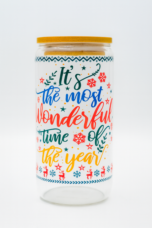 Decorative jar with festive text and designs on a white background